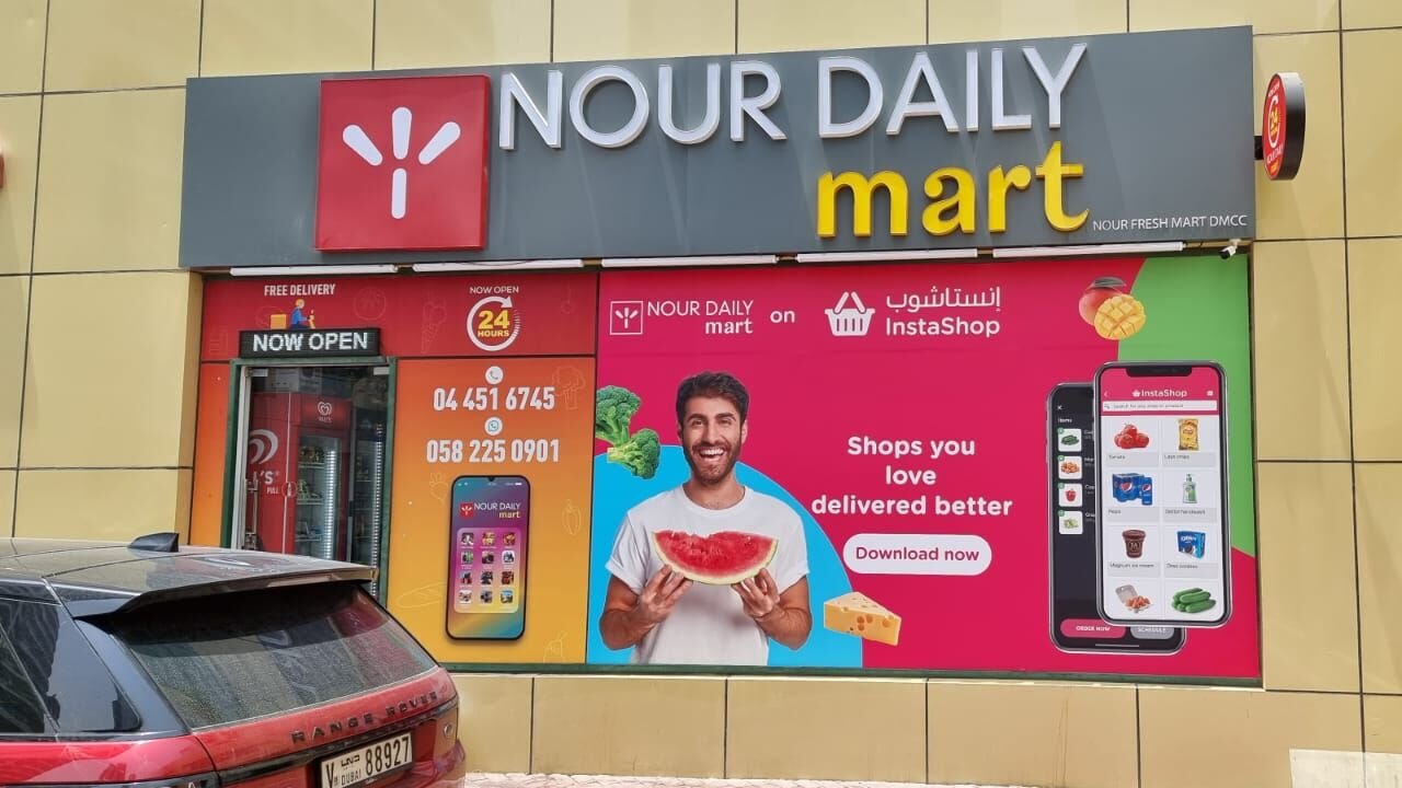 Nour Daily Mart — shopfront and window graphics